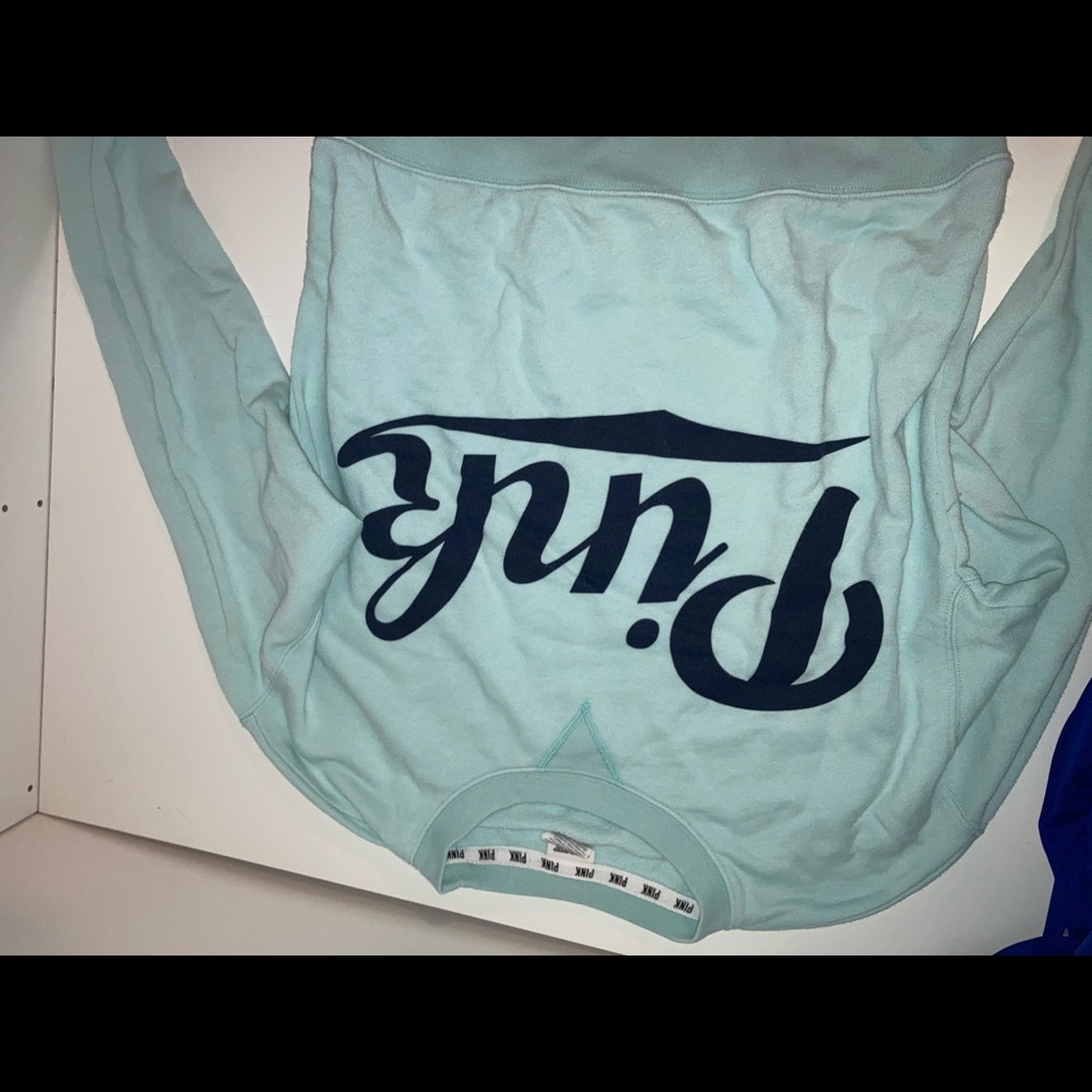 Pink sweater in blue